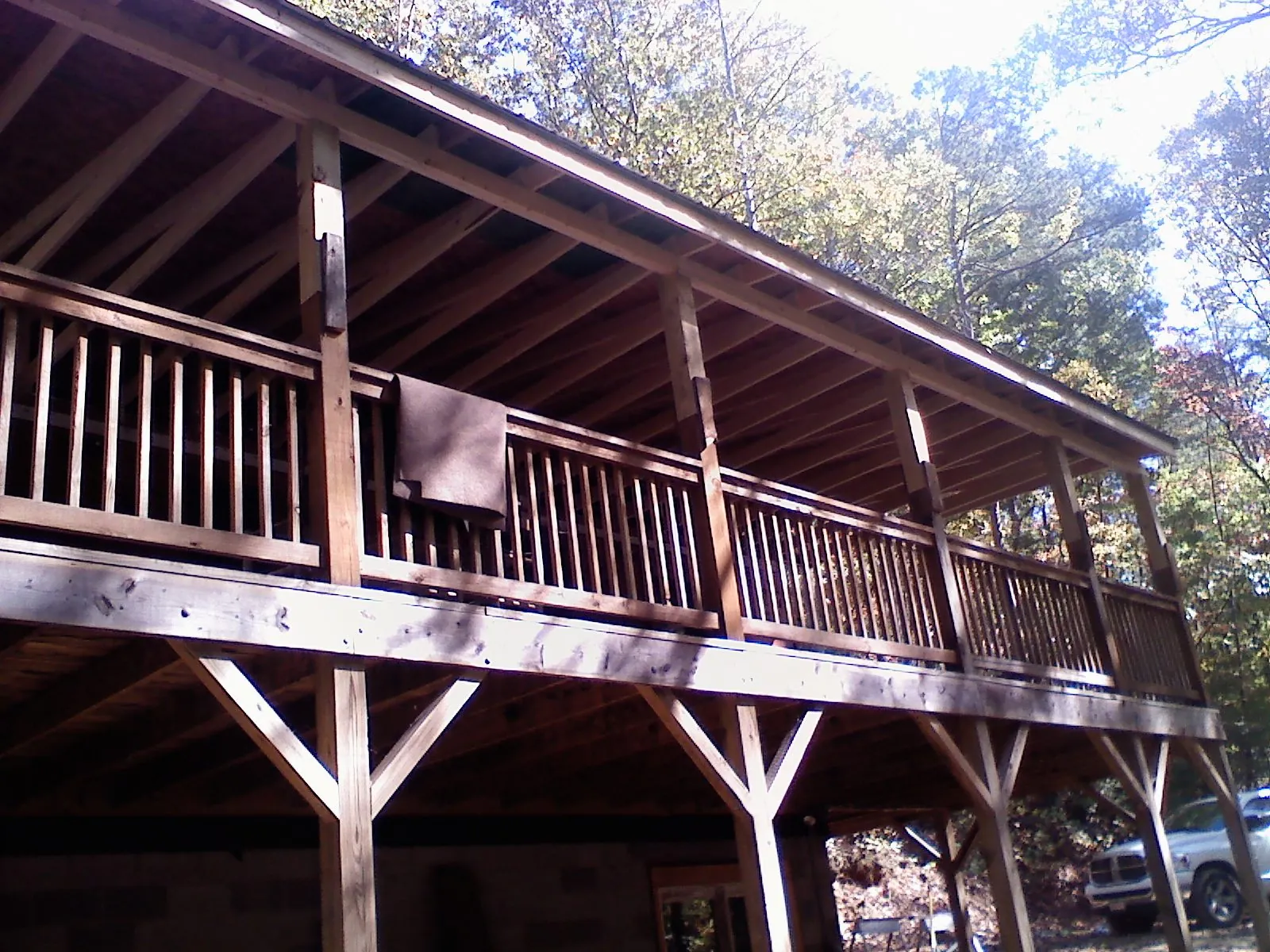 Timber framing under a new elevated porch and deck — Roof Leak Repair in Big Bend by Roofing Brothers
